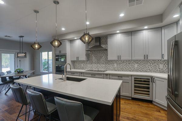 Kitchen remodel with pendant lighting working with Alair Homes