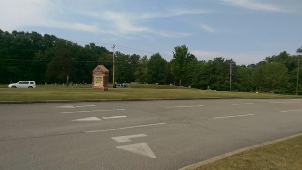 View from parking lot to the entrance road- it's the only way in or out