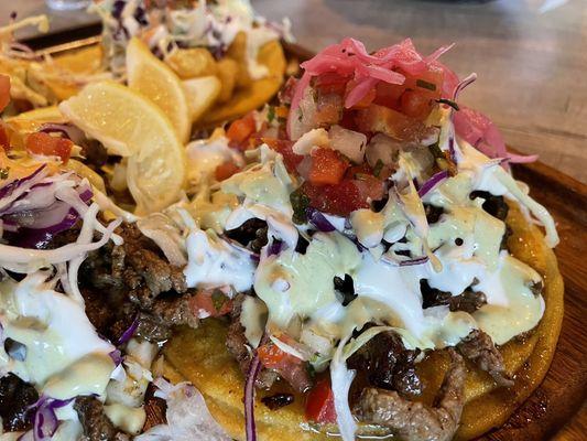 Carne Asada Taco (right), Surf & Turf Taco (left), Fried Shrimp Taco (back), Fried Fish Taco (not in photo). Surf & Turf Taco was the best!