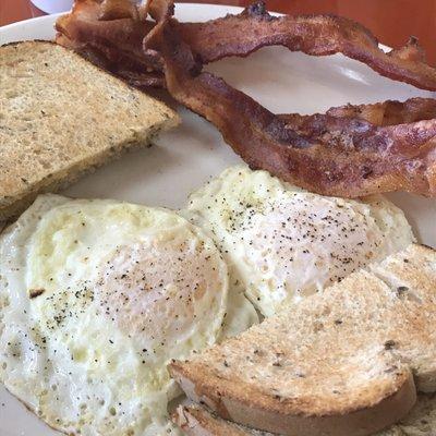 Breakfast bacon, eggs and rye toast. Always a pleasure!