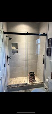 New Shower Installed with  tile walls &floor. Matte black shower valve.