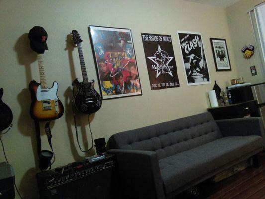 The north wall of my apartment. My futon couch/bed is the best option for small spaces like this. Looks good and is functional