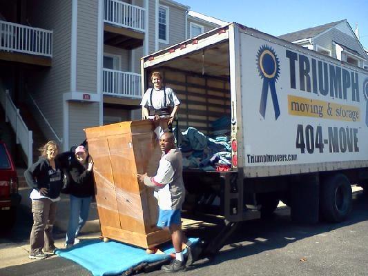 Triumph Movers prepares this armoire for its accent to the 3rd floor of this apartment building!