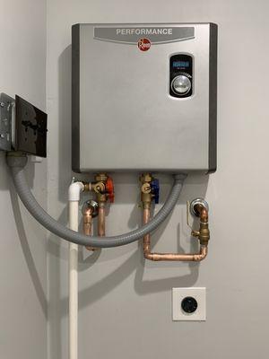 Install power for a tankless water heater, nice and clean.