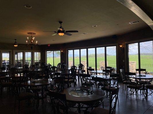 The lush green landscape through the tasting room windows