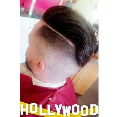 Highfade with side part done by Angie