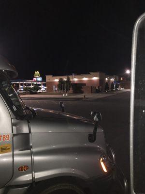 Front gas pumps and McDonald's sign