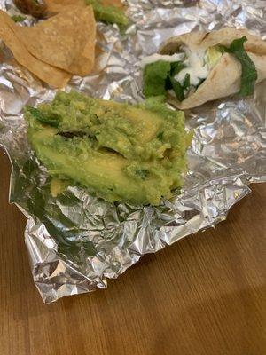 Half an avocado in our tiny guacamole cup.