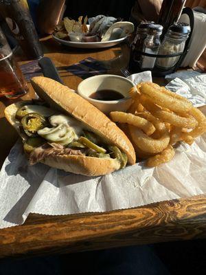 Beef sandwich with Swiss and Onion Rings. Blackened shrimp tacos.