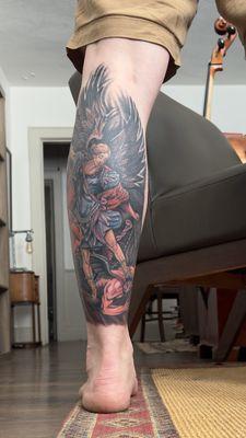 Left calf tattoo. St. Michael  Vanquishing Satan by Guido Reni 1635.