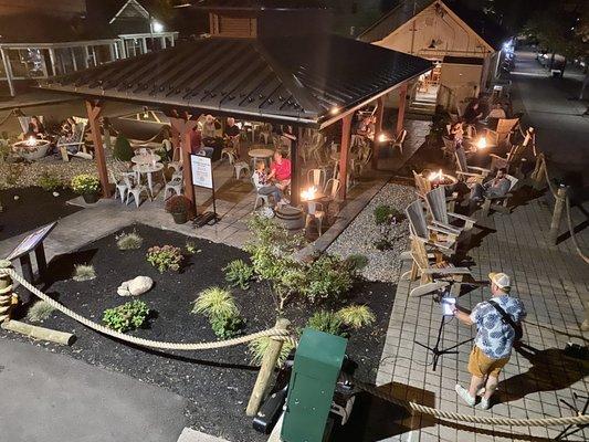 New covered Outside beer garden patio with fire pits and live music.