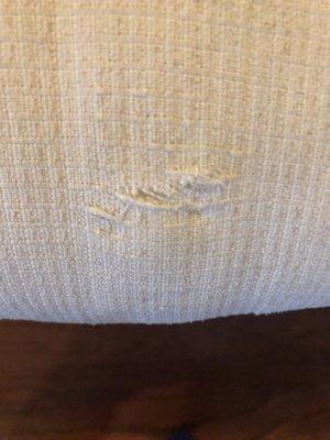 The following images are of two rips in my sofa that occur during the move that I was not compensated for. Beware of this company!