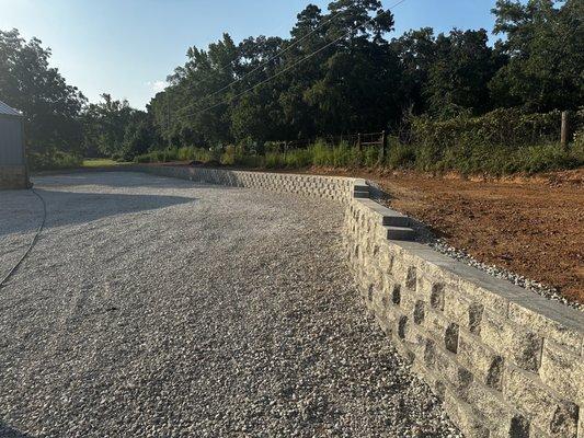 Retaining Wall and gravel drive area.