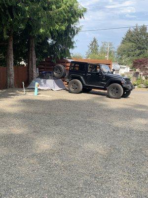 Space 5.  Tent setup on the gravel.  Have a tarp and carpet. Worked great and no issues.