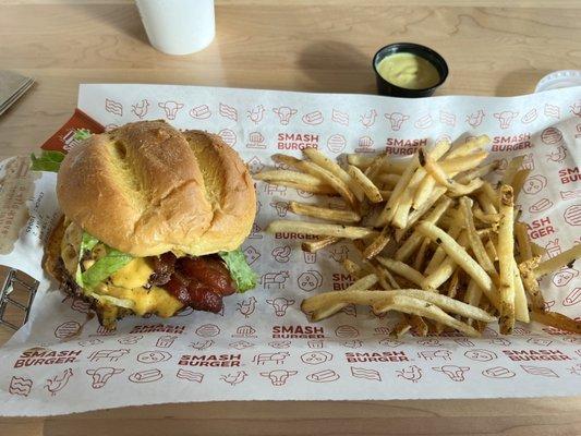 Double bacon cheeseburger with smash fries.