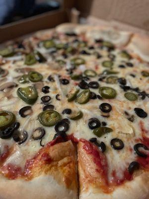 Veggie pizza, jalapeños, olives and onions only