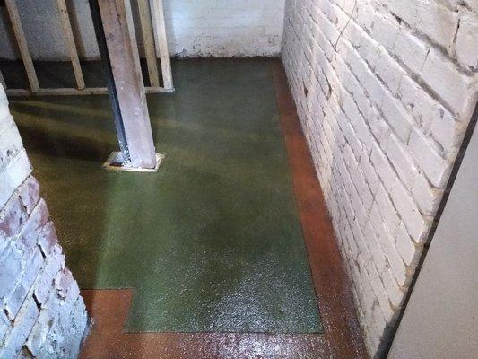 We poured and stained a wine cellar floor. Moss green with terra cotta borders. Another satisfied customer.