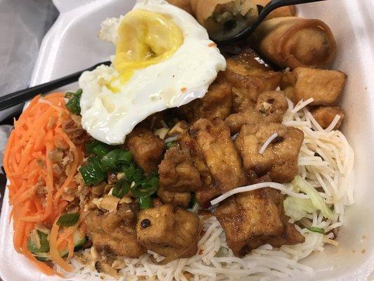 Tofu and fried egg vermicelli with veggie spring rolls -- decent but a bit dry approx $9.50 incl. taxes