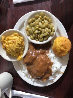 Country style steak with mac and cheese, Lima beans, and cornbread.