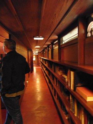 Hall to bedrooms with bookcases