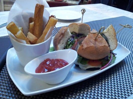 Portobello sandwich with fries.