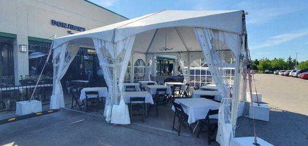 Outdoor tent for dining or private events.