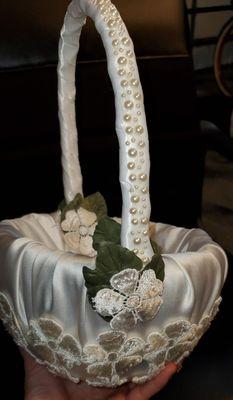 Custom made flower girl basket made from the bride's mother's wedding dress.
Designer: Albi M.