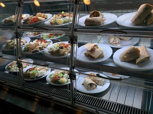 Variety of cobb salads and sandwich wraps.