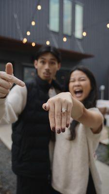 She said yes and is in love with her engagement ring!