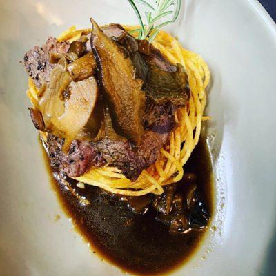 WILD MUSHROOM DEMI GLAZE, LOCAL BEEF, TRUFFLE POTATO BIRD NEST.