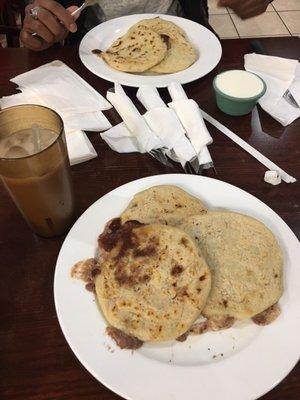 Quick trip to El Salvador.  Pupusas de frijol y queso (refried beans & cheese) w/ horchata juice on the side