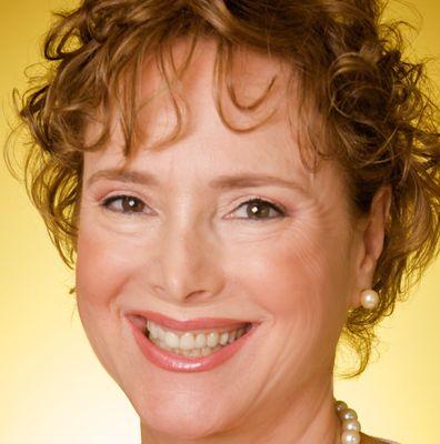 Laura Norman, world-renowned Reflexologist, Inspired Life Coach, best-selling author and educator.