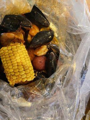 Black clams, shrimp, corn and potatoes yummy