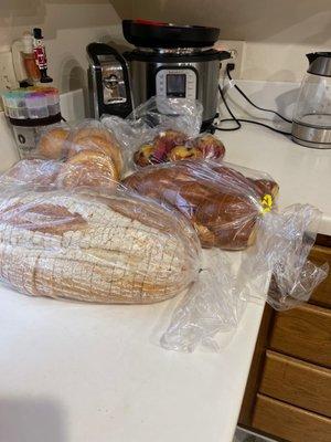 Sourdough bread, challah, hamburger buns and blueberry muffins