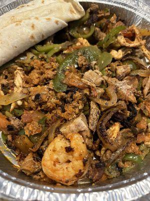 Chorizo, beef, chicken and shrimp sautéed with green peppers and onions spiced to perfection.