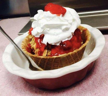 Deep Fried ice cream with fresh strawberry topping