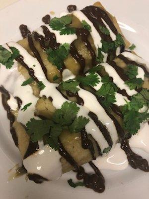 Sweet Potato Tamales in Green Chile Salsa with Mole Sauce and Sour Cream (GF)