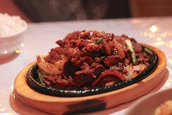 M6. Osam Bulgogi ($22.99) - Grilled squid stir fry & pork with spicy sauce