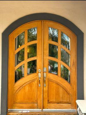 Front door refinished and varnished.