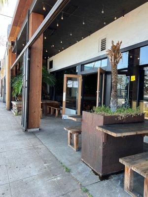 Entrance to the restaurant. You can get tables outside or inside.