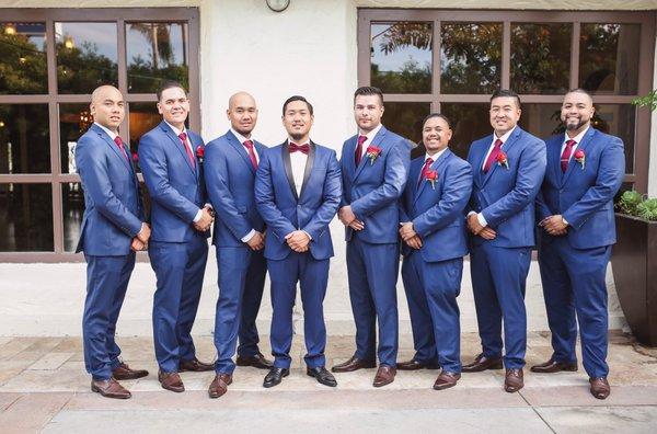 Me n my groomsmen wearing our suit from the suit co