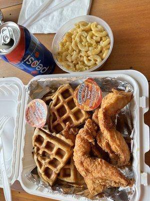 Chicken strips with waffle & Mac & cheese.