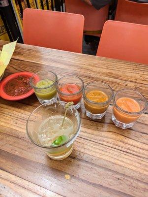 Salsa flight and Cadillac margarita. L-R House salsa, tomatillo verde, roja, chile arbol, and habanero