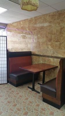 Inside of Uncle's Fried Chicken, I believe the room divider is to give privacy for niqabi's & sisters when eating.