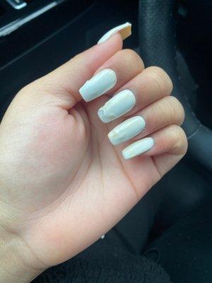 I got my nails 10/24 and on 10/25 they look liked this.