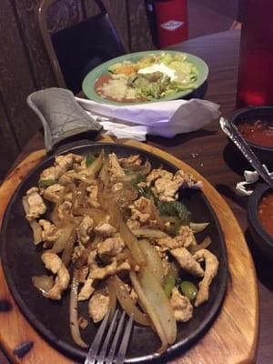 Chicken fajitas no tomatoes. Their hot sauce has great flavor.