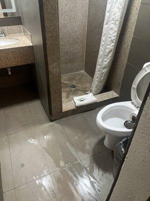 Wet floor where towel was placed