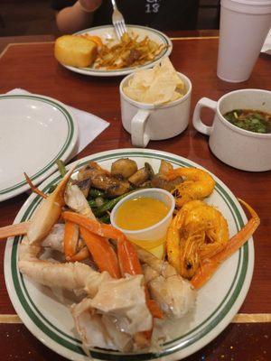 Snow crab legs, salt and pepper shrimp, fired green beans and sauteed mushrooms.