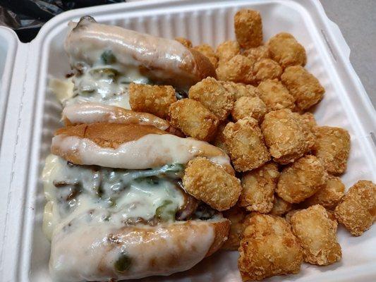 Philly Cheese steak. Med size but flavorful. Provolone cheese and green peppers. Crunchy tots.