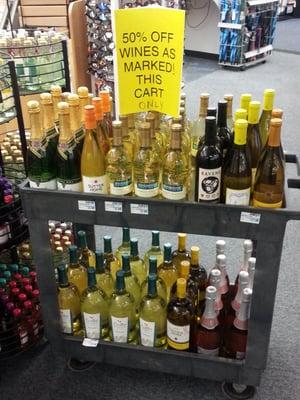 There's a 50% off sale on selected wines near the cashier stations.